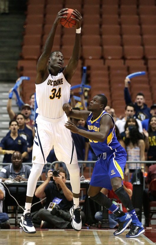 UC Irvine's Mamadou Ndiaye, left, of Senegal, is defended by UC Riverside's Cheick Thiero during the first half of an NCAA college basketball game in the Big West Conference tournament, Thursday, March 12, 2015, in Anaheim, Calif. (AP Photo/Jae C. Hong)
