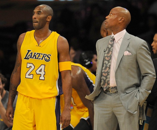 Los Angeles Lakers guard Kobe Bryant #24 stands next to coach Byron Scott in the first half. The Lakers played the Minnesota Timberwolves in the opening game of the 2015-16 NBA season. Los Angeles, CA, 10/28/2015 (photo by John McCoy/Los Angeles News Group)