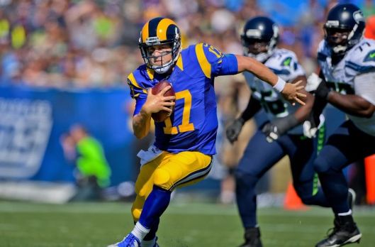 zSep 18, 2016; Los Angeles, CA, USA; Los Angeles Rams quarterback Case Keenum (17) rushes against the Seattle Seahawks during the second half of a NFL game at Los Angeles Memorial Coliseum. Los Angeles won 9-3. Mandatory Credit: Kirby Lee-USA TODAY Sports