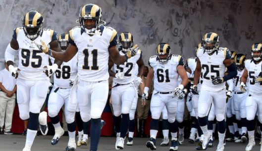 LOS ANGELES, CA - AUGUST 20:  Tavon Austin #11 (C) of the Los Angeles Rams runs out of the tunnel before the game against the Kansas City Chiefs at Los Angeles Memorial Coliseum on August 20, 2016 in Los Angeles, California.  (Photo by Lisa Blumenfeld/Getty Images)