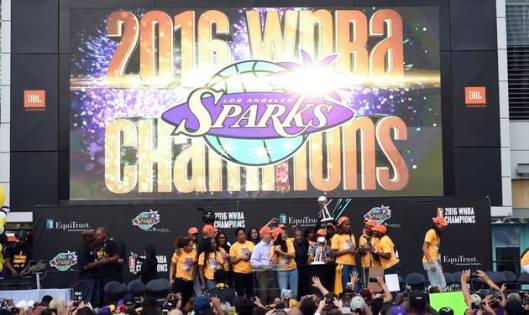 Los Angeles Sparks celebrate with fans their winning the 2016 WNBA Championship at Chick Hearn Court at LA Live in Los Angeles, Monday, Oct. 24, 2016. (Hans Gutknecht/Los Angeles Daily News via AP)